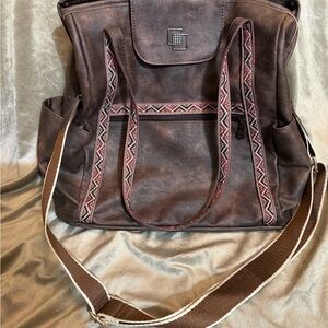 Brown Leather Backpack with Patterned Straps
